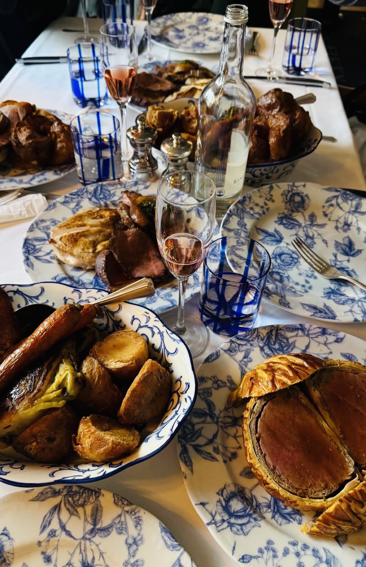 Abundant shared feast at a private table
